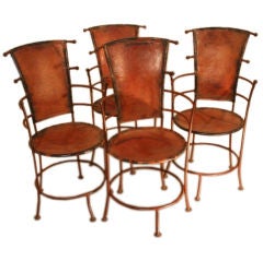 A 1920’s/30’s pair of French iron and leather designer chairs