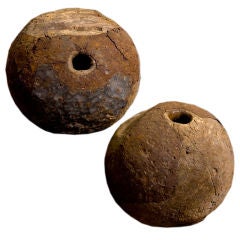 Pair of antique wood and iron game balls
