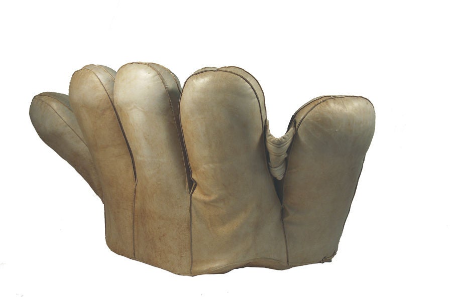 Original baseball glove lounge chair, designed in homage to Joe DiMaggio. Original leather, faded, with impressed markings. On wheels for easy moving. Made by Poltronova.