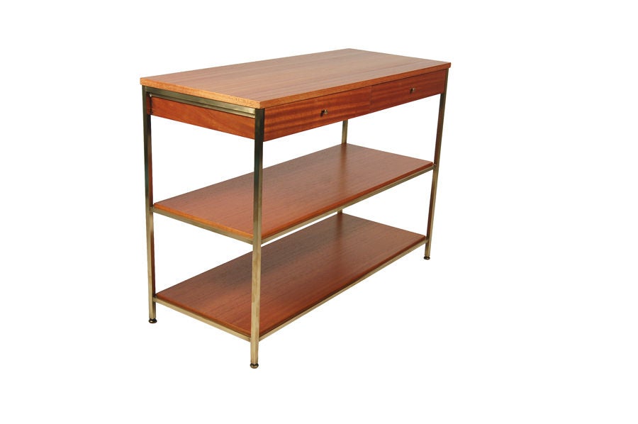 Small server, ribbon mahongany with brass trim. Two drawers and two lower shelves. Restored. Made by Calvin.