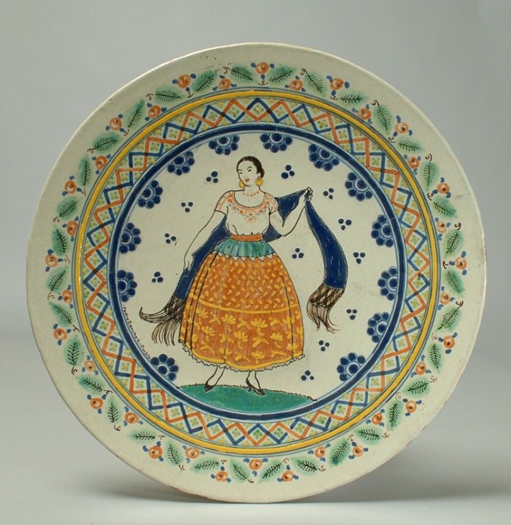 A rare early 20th century signed talavera Poblana pictorial platter. Signed 