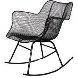 A Wrought Iron and Mesh Rocker by Russell Lee Woodard Co.