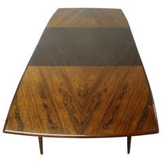 A Large  Boat Shaped Rosewood Dining Table