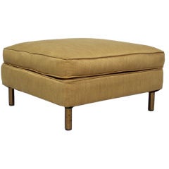 A Square Ottoman with Brass Legs by Edward Wormley