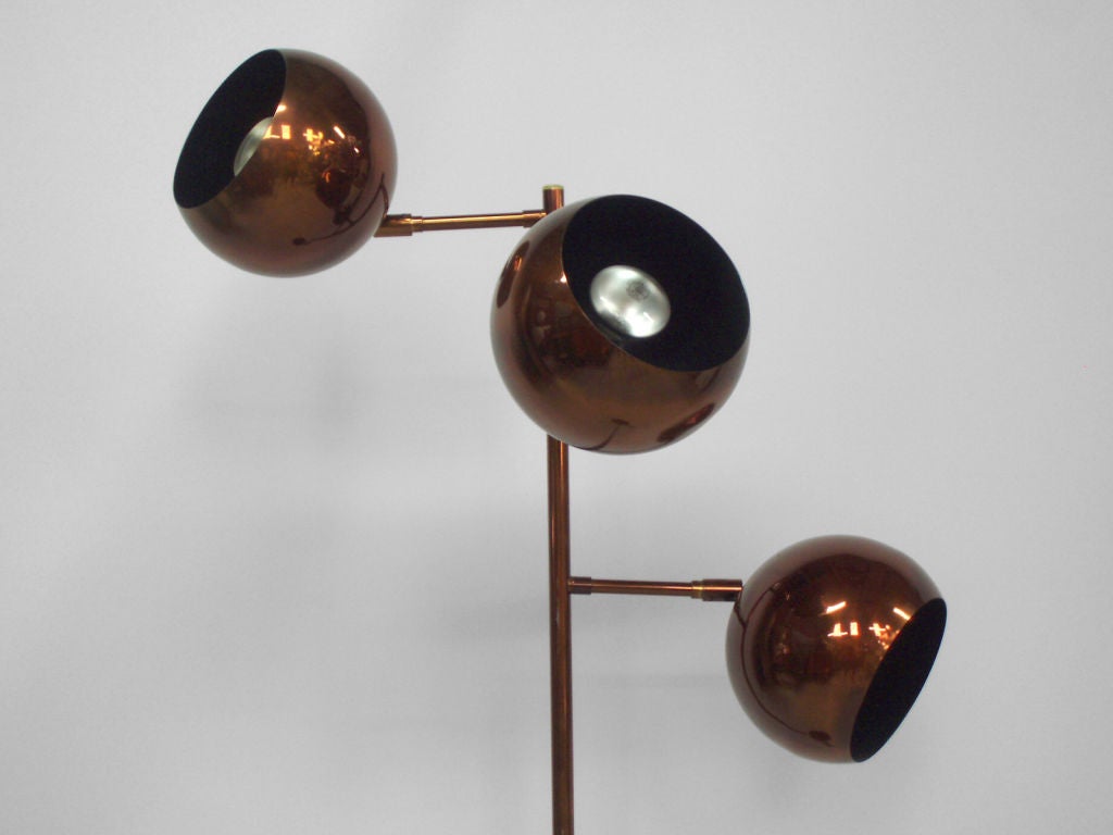 Three globe copper finished floor lamp, Possibly by Kovacs or Sonneman