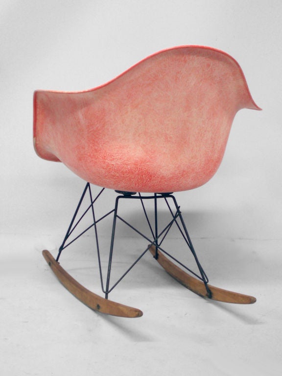 An Early Eames Rope Edge Rocker by Charles & Ray Eames for Herman Miller. Wonderfully Grained Fiberglass Polished Red  Shell, Rope Edge 