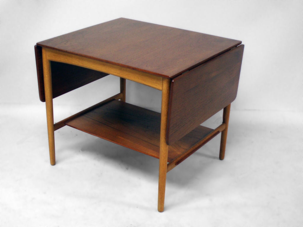 A Teak and Oak Drop Leaf Occasional Table by Hans Wegner