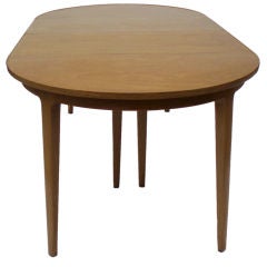 A Blonde Extension Dining Table by Edward Wormley