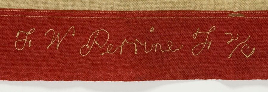 WWII BATTLE FLAG FROM THE U.S.S. FLINT WITH 48 STARS, BROUGHT HOME BY FIREMAN 2ND CLASS F. W. PERRINE, EMBROIDERED WITH HIS NAME, THE SHIP’S NAME, AND DATES OF SERVICE:<br />
<br />
This extraordinary piece of history is a small-scale battle flag
