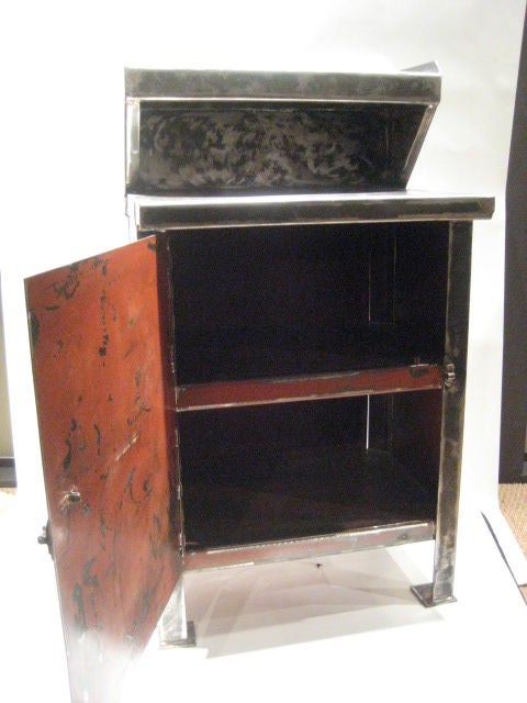 Handsome Industrial Cabinet with internal storage and recessed shelf.