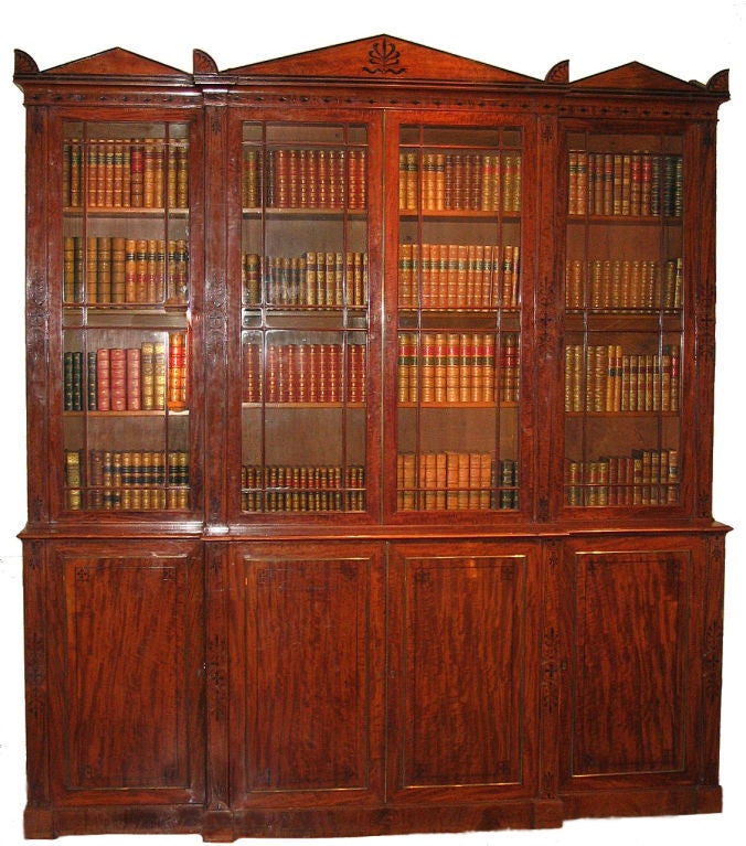 English Regency mahogany breakfront bookcase, by George Oakley. For Sale