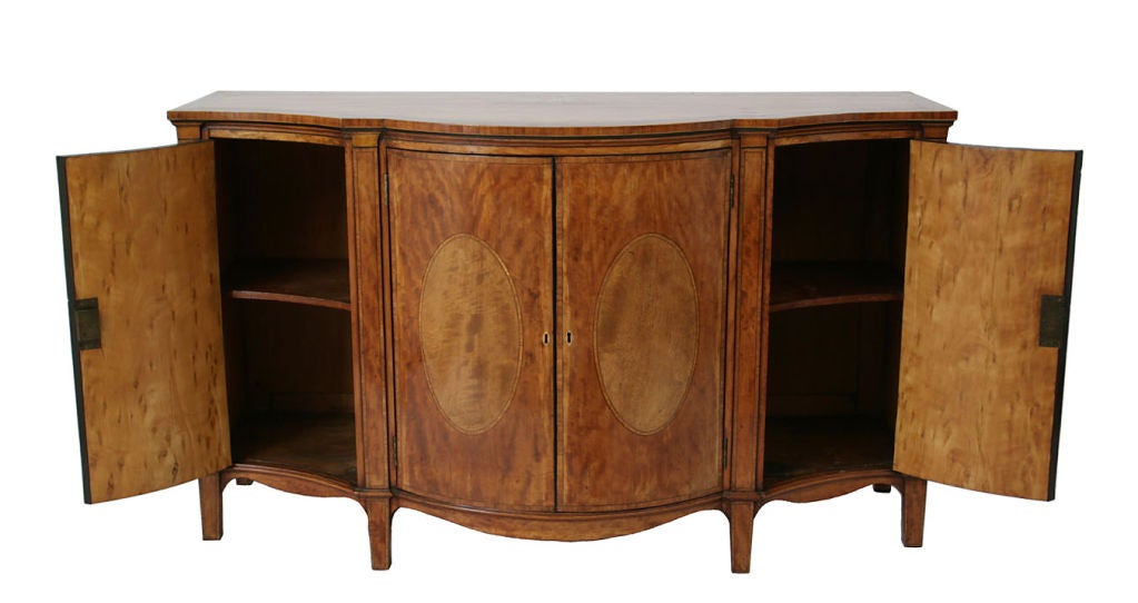 George III satinwood serpentine commode