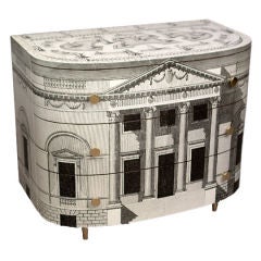 Demi-lune commode by Fornasetti.