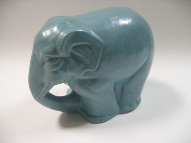 Beautiful ceramic elephant in a gorgeous robin's egg blue, crackled finish.