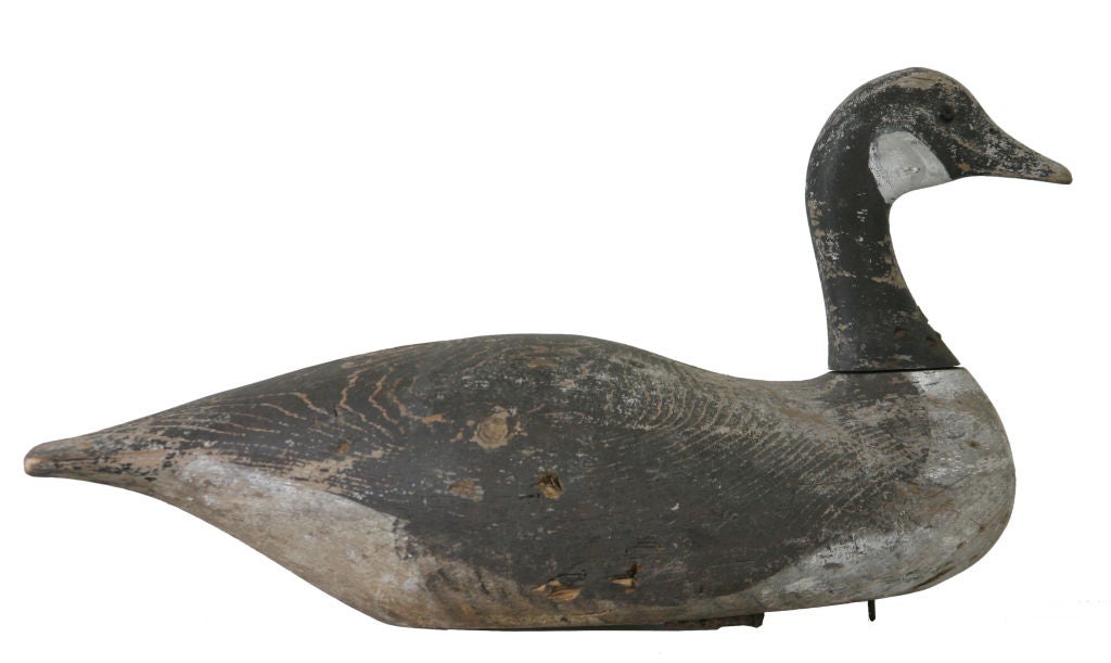 Carved and painted Canada goose decoy attibuted to Joe Lincoln, famous Massachusetts carver.  Noble form and beautifully worn surface.