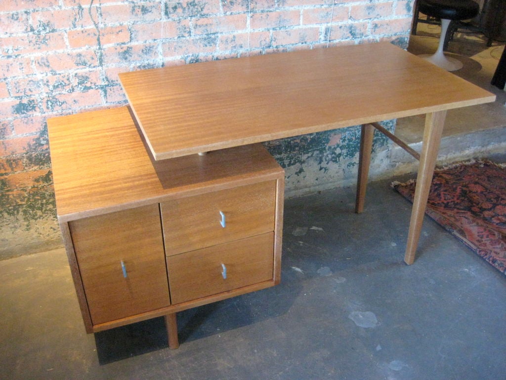 A mahogany desk deigned by John Keal for Brown Saltman.