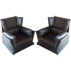 Vintage Pair of rare leather armchairs by Piero de Martini for Cassina