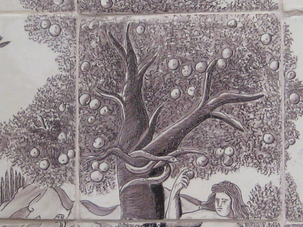 12 tiles composing the picture of Adam and Eve in the Garden, before the apple tree and labelled 'DEVAL.' or 'The Fall' in Dutch,<br />
Manganese on white ground