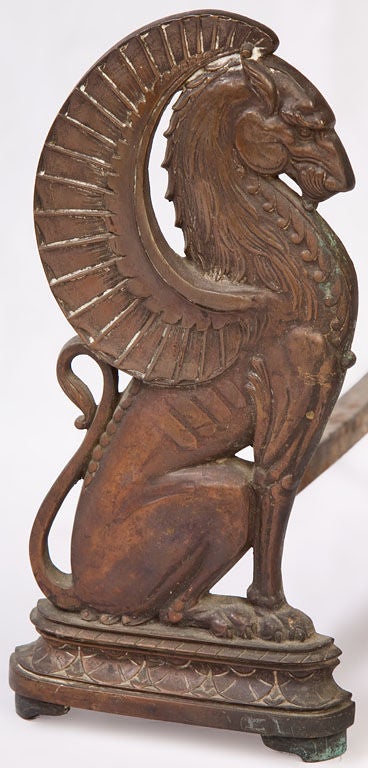 Pair of stylized Griffin form andirons