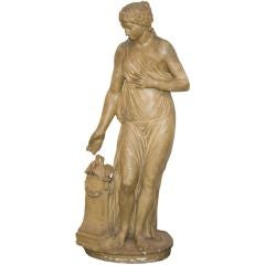 French sculpture of a classical woman feeding love birds