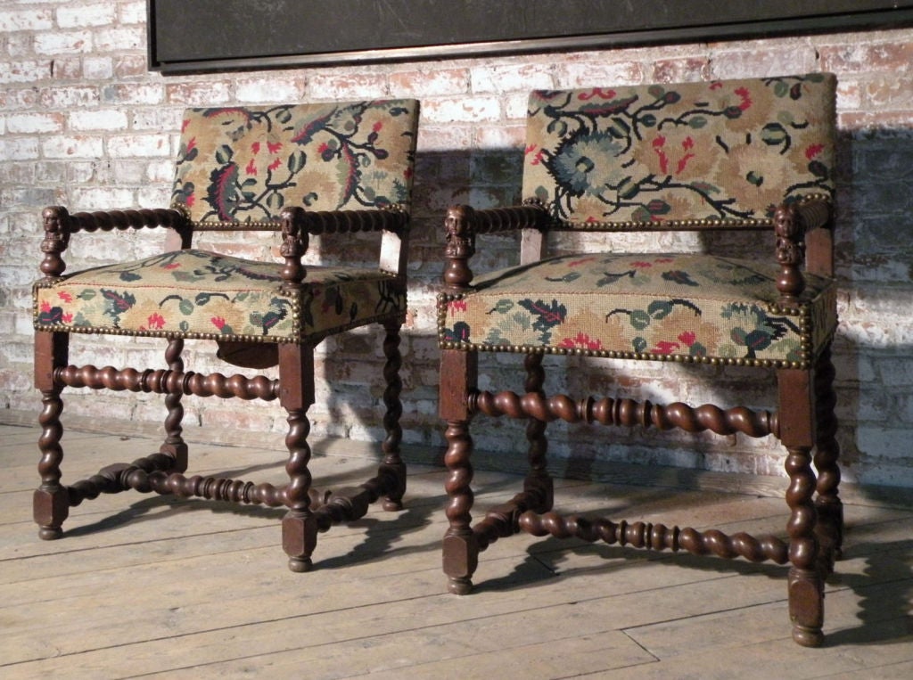 Lovely pair of Louis XIII chairs with period needlepoint covering. The turned arms ending in poupee figures.
Our pieces are left in lived-in condition, pending our custom conservation and polish to preference.
On consignment from a sophisticated