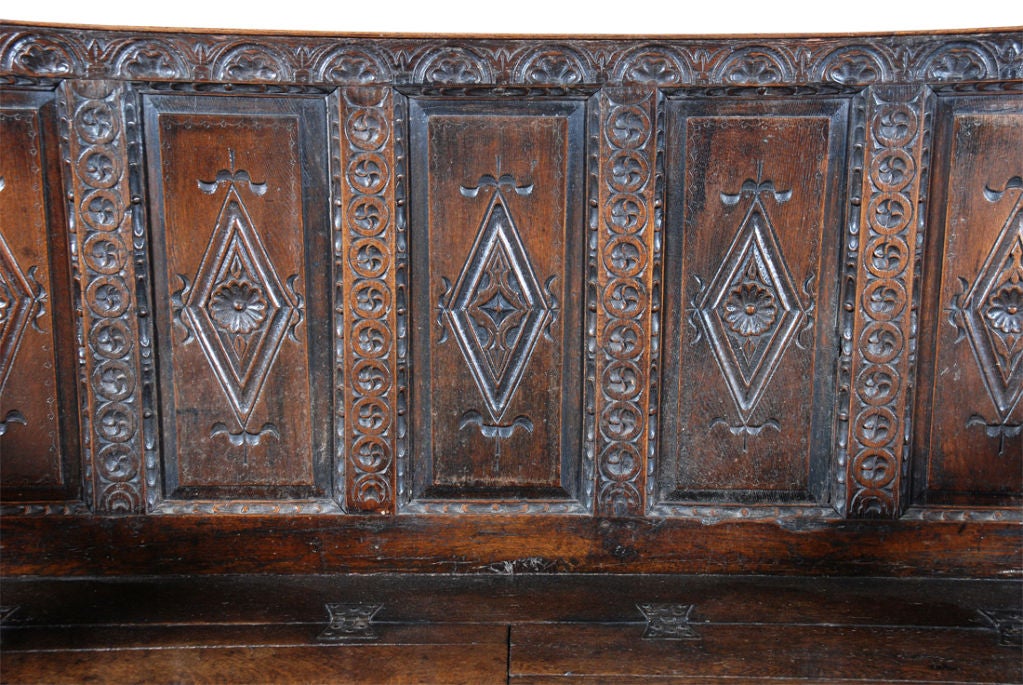 Highly Carved Charles II Oak Settle