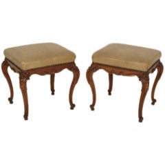 Pair of Louis XV provincial carved beechwood benches