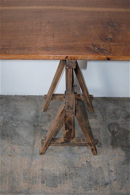 Antique oak trestle-based architect's table of delicate proportions.