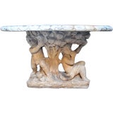 Stone cherub table