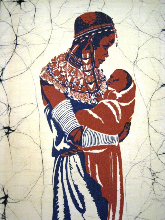 Hand printed African batik depicting a Mother and Child in traditional dress with an elaroborately beaded necklace and headband. It was made in Kenya by hand and mounted on a stretcher to display in a fruitwood frame. It is signed in the lower right