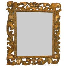 A carved and gilded framed mirror