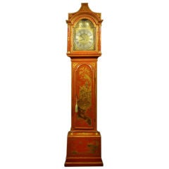 A George III Red Lacquer And Gilt Longcase Clock
