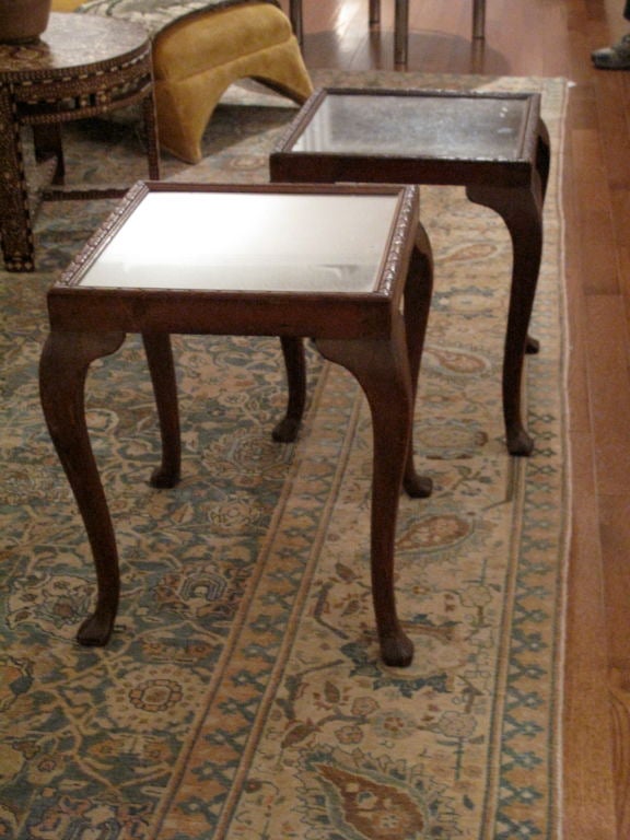 Pair of American side tables with mirrored tops.