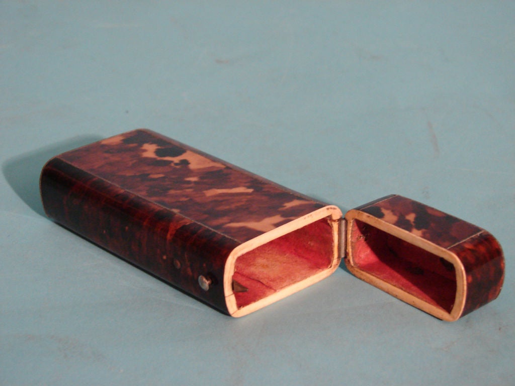 A Continental tortoiseshell rectangular cigar case with silver stringing.  Mid-19th century.