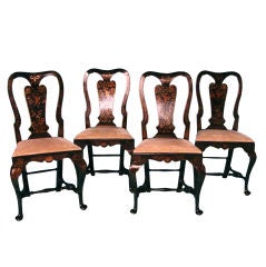 A set of four George II black Japanned side chairs