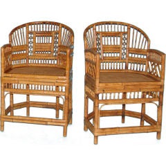 A pair of Brighton Pavillion style bamboo armchairs