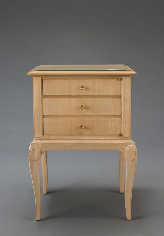 Each with a molded edge rectangular top fitted with brass corner mounts securing glass tops, one with three drawers, the other with a door with 3 false drawers, on four scroll top cabriole legs.<br />
<br />
<br />
This item @ H.M.Luther <br