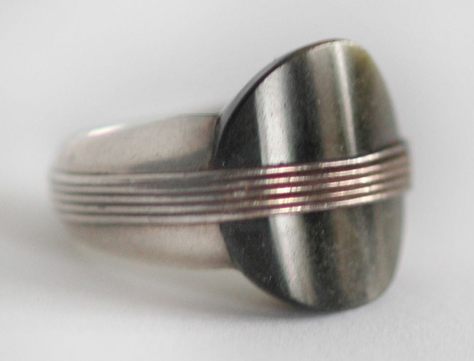 PLEASE VISIT LAUREN STANLEY IN NYC

A rare circa 1945 obsidian and sterling silver ring by William Spratling, of Taxco, Mexico,  the sterling silver band with applied wire encircling the entire ring, the obsidian stone placed under the wiring.  No