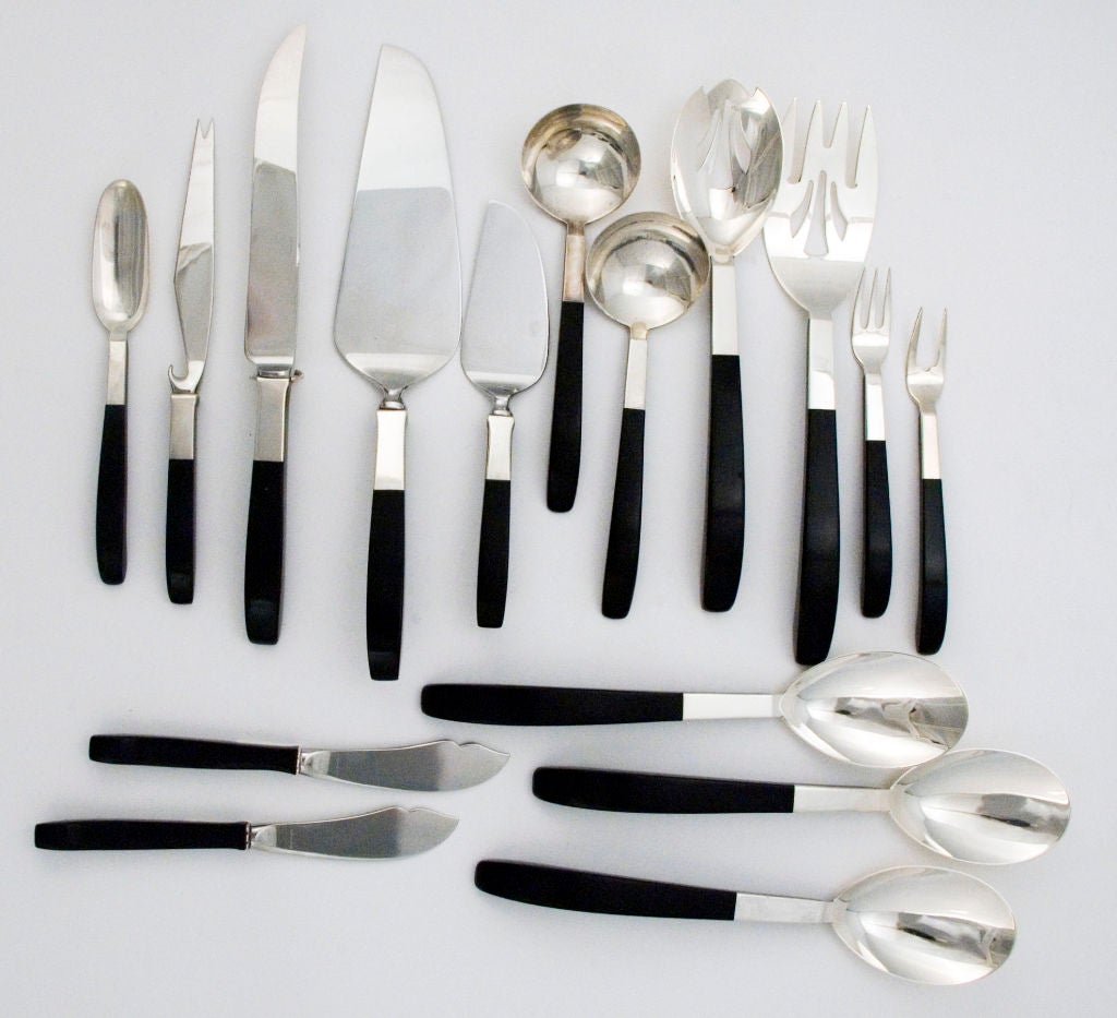 PLEASE VISIT LAUREN STANLEY IN NEW YORK
THIS IS THE LARGEST AND BEST SET IN THE WORLD! ALL PLACE AND SERVING PIECES !

A fine circa 1956 sterling silver flatware set designed by Nord Bowlen for Lunt, of Greenfield, MA, using black nylon as a