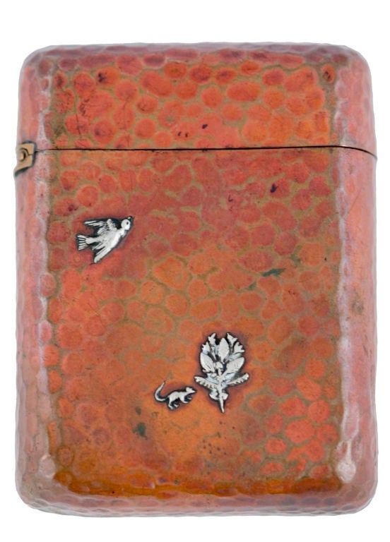 PLEASE VISIT LAUREN STANLEY IN NEW YORK<br />
<br />
A fine circa 1883 sterling silver and copper cigarette case by Gorham, of Providence, RI, the copper case with a flip lid and applied sterling silver elements, a bird's nest, young boy with