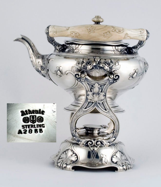 PLEASE VISIT LAUREN STANLEY IN NEW YORK <br />
<br />
a fine circa 1899 Athenic motif sterling silver and ivory six (6) piece tea and coffeeset with kettle on stand by Gorham, of Providence, RI, the background hand hammered, comprising coffee pot,