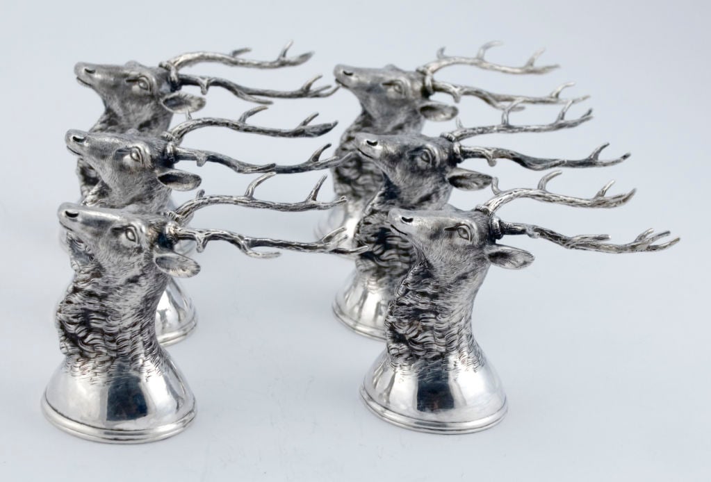 A fine set of six solid silver 19th century after the hunt drinking cups - shot glasses by an unknown Russian maker, in the form of an elk, deer, stag in all its glory with long antlers and realistic fur on it's neck, the head looking up proudly,