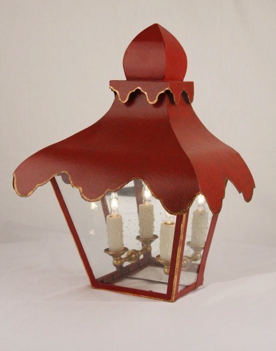 The Tole Tent Lantern Collection is handmade and hand painted by artisans in California.<br />
<br />
Standard finishes: Black, Ivory, Red, Gray<br />
Standard Size: 14