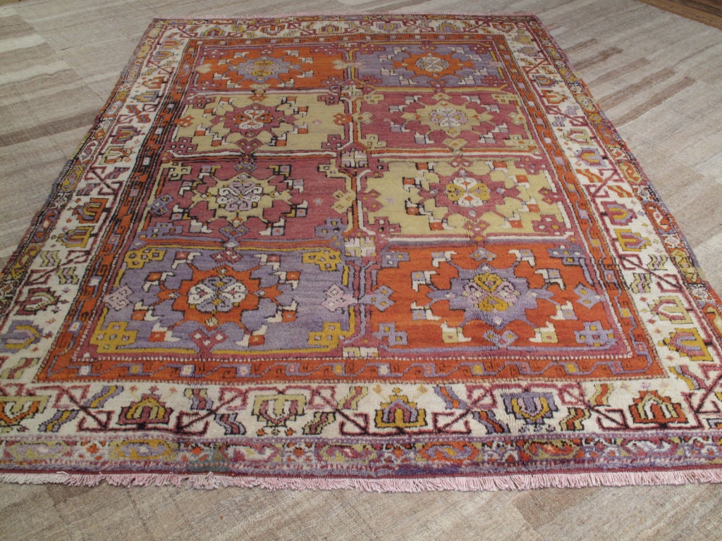 Yuntdag carpet. Lovely village carpet or rug from Western Turkey featuring a classical design from this region. Great colors.