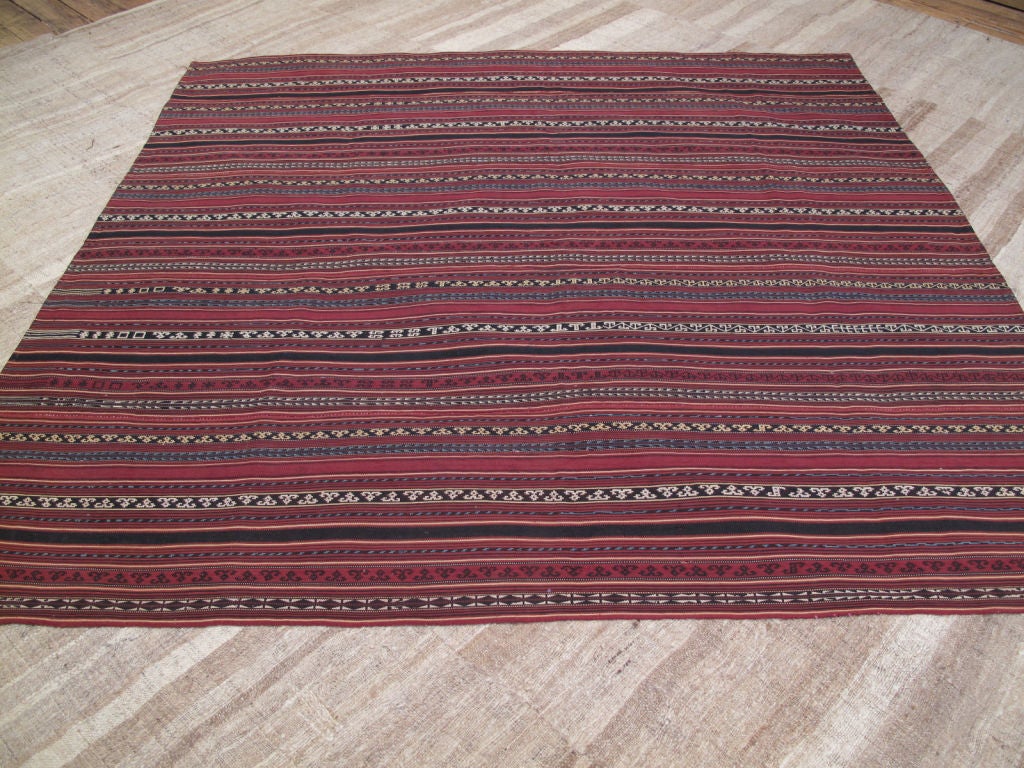 A very fine antique tribal cover from Azerbaijan, woven in an intricate warp-substitution technique. One of the finest we've ever handled. It would make an excellent bedspread, table cover or wall hanging.
