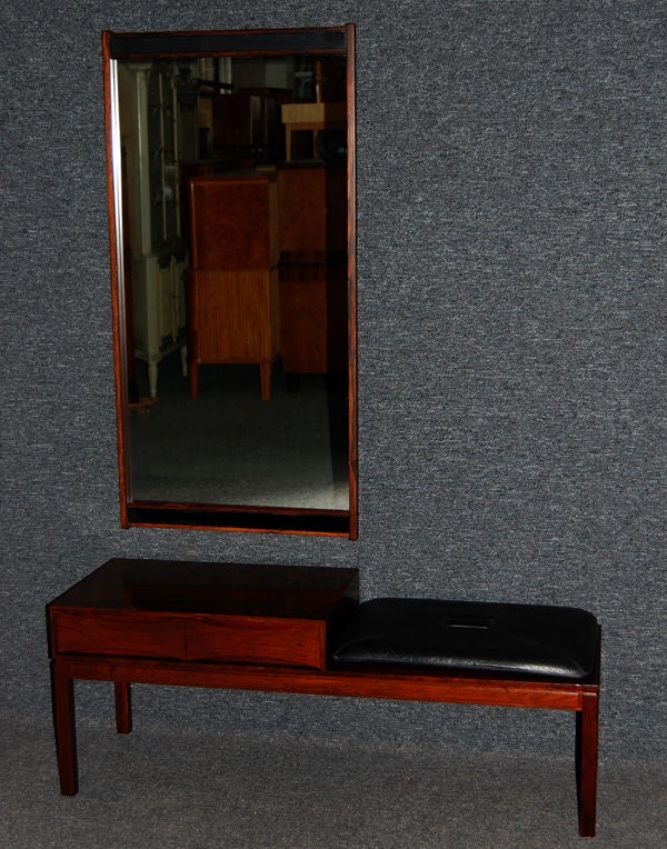 Mid-Century Modern foyer/hall console table/bench and mirror set by famed Danish designer and cabinetmaker Borge Mogensen.  Crafted of rich jacaranda wood, these pieces are in impeccable condition.  Jacaranda mirror is in very good condition with