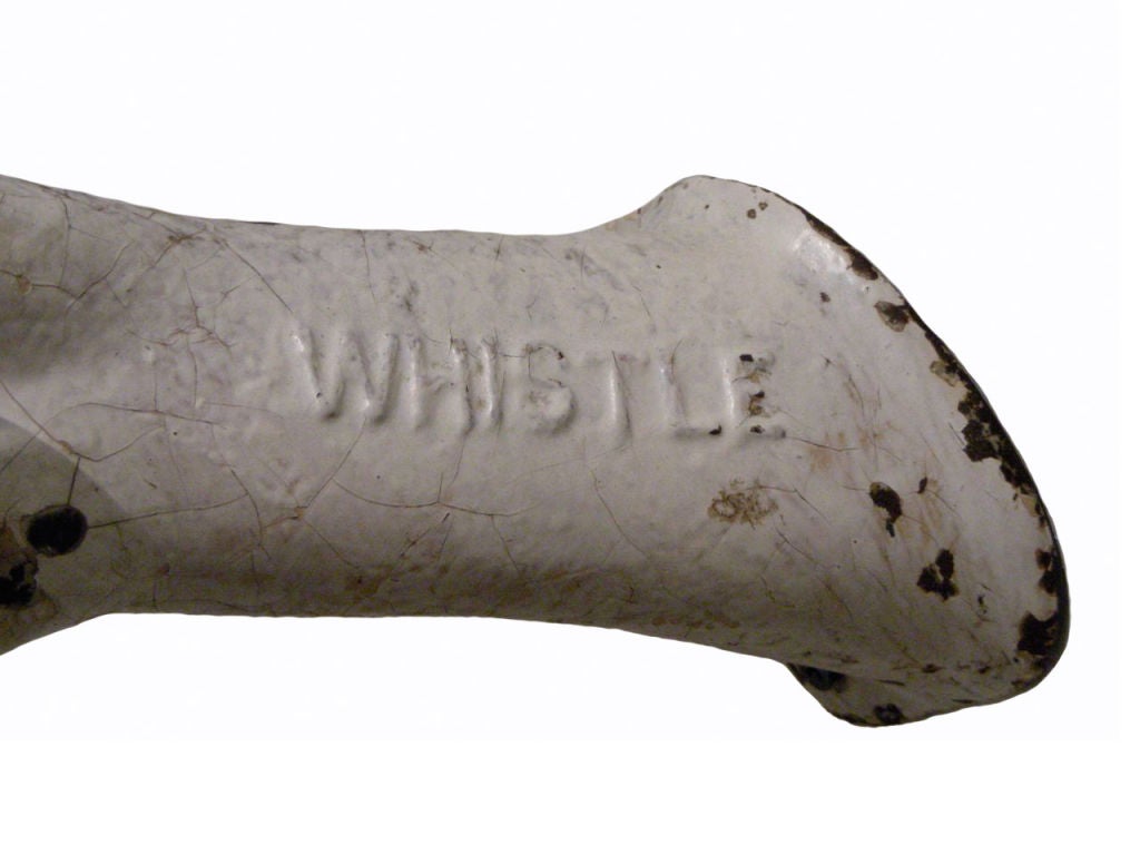 Unusual circa 1900 cast iron arm, stamped 'Whistle', holding an original soda bottle with Whistle bottle cap intact, all in old paint, surface and condition