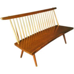 Walnut settee/bench by George Nakashima