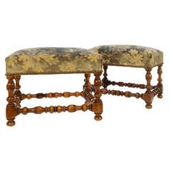 Elegant French Pair of Walnut Stools with tapestry upholstery.