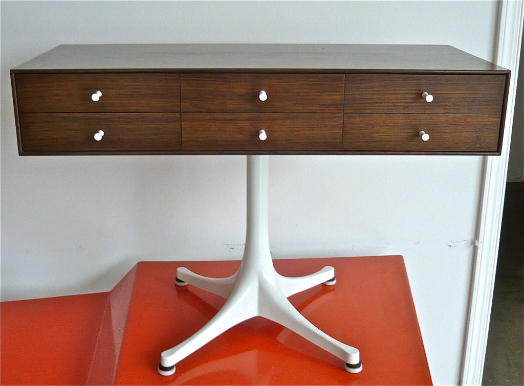 Rosewood chest on swag leg base manufactured by Herman Miller.